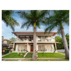 Capturing the essence of elegance and tranquility, this stunning villa with its multiple balconies is nestled amidst lush greenery, setting the stage for a life of luxury and comfort.