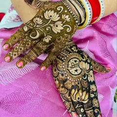 Another angle of the personalized lotus mandala design, showing how it pairs with a floral pattern on the other hand.