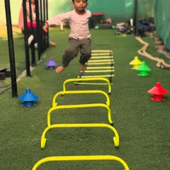 Even our three-year-old athletes get in on the action. Navigating hurdles and agility ladders helps develop crucial motor skills and coordination from a very young age.
