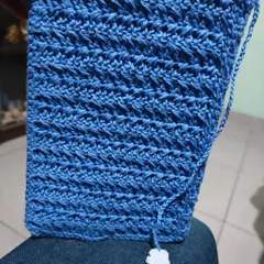 The beautiful texture of the crochet stitch used for my book covers. This one is shown before the floral embellishments are added.