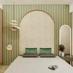 This bedroom is a sanctuary of calm, blending muted greens with natural wood and cane textures. The arched accent wall behind the bed creates a soft, inviting focal point, while the perforated wardrobe doors and layered lighting add depth and warmth. It’s a minimalist design that is rich in detail, perfect for unwinding after a long day.