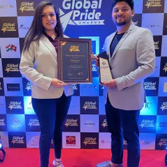 Our project manager and interior designer proudly holding our award. A successful turnkey project requires seamless collaboration between the design and execution teams, and we are proud of the talented people who make it happen.