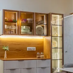 A closer look at the elegant crockery unit with integrated lighting, showcasing how I blend display and storage to create functional art within the home.