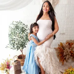 The sweetest hug for mom and the baby bump. Capturing the bond between a mother and her child before the new baby arrives is just so precious.