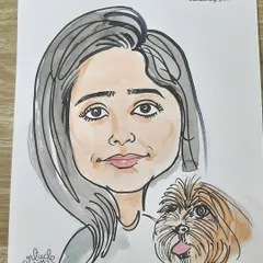 A beautiful portrait of a woman and her fluffy companion, drawn live at the JUSTDOGS event. Pet caricatures are a unique way to celebrate our animal friends.