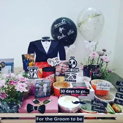 This hamper for a groom-to-be features a delicious platter of popular Indian street food. It includes Pani Puri, Dhokla, Samosa, and Pav Bhaji to pamper him before the wedding.