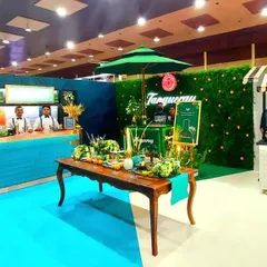 We design and build immersive brand activation spaces, like this vibrant setup for Tanqueray and Baileys. It features a main bar, a separate tasting cart, and themed decor to create a memorable destination for event attendees.