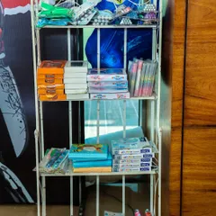 A shelf filled with return gifts and prizes, showcasing the variety of party favors we can arrange for your event.
