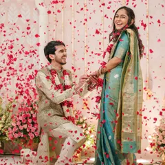 The pure, unscripted joy of a proposal. We are there to capture the peak emotions of your engagement ceremony, like this beautiful moment showered in rose petals.