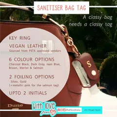 Here is my personalized sanitizer bag tag shown on a handbag. It's made from high-quality vegan leather and keeps your sanitizer accessible while adding a classy, custom touch to your accessories.