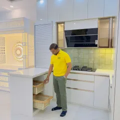 Here I am showing the wicker basket drawers I installed in this kitchen. They are perfect for storing onions and potatoes as they allow air to circulate, keeping them fresh for longer.
