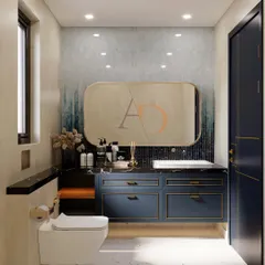 A sophisticated bathroom design featuring a navy blue vanity with gold profile handles and a black marble countertop. The custom kit kat mosaic tiles on the wall have a soft ombre effect, adding depth and artistry to the space.
