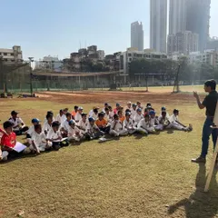 Our players listening intently during the workshop. We teach them practical techniques to handle distractions and maintain concentration during high-pressure game situations.