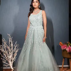 A full-length photo of the powder blue gown, showing its elegant silhouette.