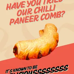 Looking for a spicy kick? Our Chilli Paneer Comb features a multi-layered puff pastry filled with a spicy, flavorful paneer filling. It's a vegetarian delight that will spice up your life.
