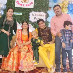 A family celebrates together at a 'Mundan Party'. We are experienced in photographing traditional Indian ceremonies and capturing all the important rituals and family moments.