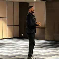 A side profile shot as I move through an event space. My performance isn't confined to the stage; I bring the magic directly to your guests.