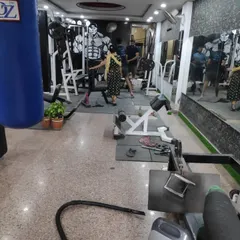 The gym in action. It's not just about the machines, it's about the community of people working hard to achieve their goals.