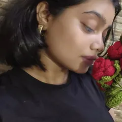 Me and my flowers which will never die. I love taking a moment to just appreciate the things I've created, like this beautiful bouquet of red roses.