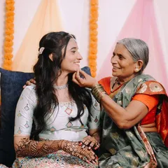 A tender moment between the bride and her grandmother during the Mehndi ceremony. These multi-generational photos are so important and full of love.