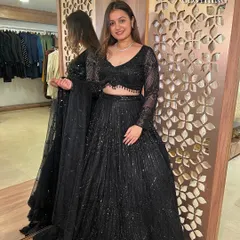 Make a statement at your next cocktail party or reception with this glamorous black sequin lehenga. It’s one of my most popular party wear rentals, perfect for turning heads without the high cost.