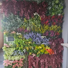 This is the same vibrant artificial wall from a slightly different angle, showing how the light catches the different textures. These panels are designed to look realistic and full from every viewpoint.