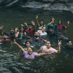 Nothing beats the feeling of jumping into a cool, natural waterfall pool with your new friends. This is our crew in Wayanad, making a splash and creating memories that are anything but ordinary. Pure, unadulterated fun.