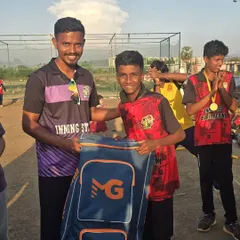 Our player receiving the Most Valuable Player (MVP) award for his outstanding all-round performance in the tournament.