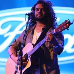 We celebrate our talented alumni like Mr. Anurag Wankhade, our "Best Rhythmite Maestro" for guitar and singing. He is seen here performing on a professional stage, inspiring our current students.