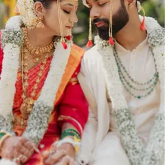 A quiet moment of connection between the bride and groom during their Marathi wedding ceremony.
