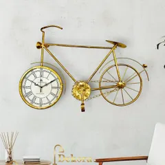 The golden bicycle clock, a testament to our detailed metal craftsmanship, from the delicate chain to the classic Roman numeral face.
