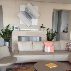 "Flight of Knowledge" in its forever home in New York. This piece, shaped like an open book, carries stories of wisdom and joy, and it's wonderful to see it resting on its new perch.