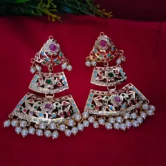 A detailed view of the 'सुहानी' (Suhani) earrings. These tiered earrings perfectly complement the necklace, featuring the same rich colours and craftsmanship to complete your regal look.