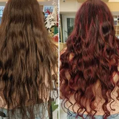 Before and after showcasing a complete colour makeover. The new red tones bring life and energy to her natural curls, defining each strand beautifully.