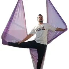This is a great hip opener pose. The hammock supports your standing leg, so you can focus on opening the hip of the other leg.