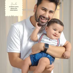 The safest place in the world is in a father's arms. This portrait captures the pure joy and strong bond between a dad and his son.