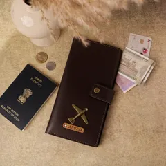 My travel wallet is designed to keep all your important documents in one place. This personalized vegan leather wallet has space for a passport, cards, and currency, secured with a snap closure.