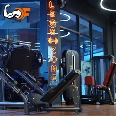 Welcome to the 'Legs Zone'. Our gym features dedicated areas with specialized equipment like the leg press and leg extension machines to help you build a strong lower body.