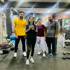 A mirror selfie with some of my dedicated clients. We all work hard to achieve our fitness goals together.