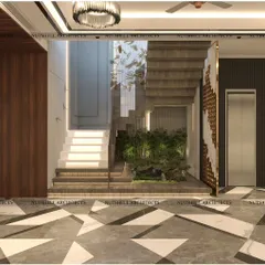 This view showcases the interplay of different materials in the lobby, including geometric stone flooring, exposed brick, and warm wood. The design incorporates a glass elevator and a floating staircase with an under-stair garden.