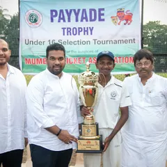 A young champion proudly holds the Payyade Trophy alongside our club officials. This moment represents a significant achievement in his journey through the MCA selection pathway.