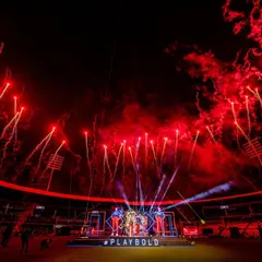 For RCB Unbox, we filled the stadium with the team's fiery spirit. This shot captures the peak of the event, with a custom stage design and a massive red firework display that created an electrifying atmosphere for tens of thousands of fans.