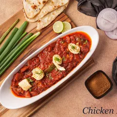 Our Chicken Lapeta features a thick, spicy gravy that clings to the tender chicken pieces. It's a robust and flavourful dish, garnished with egg swirls.