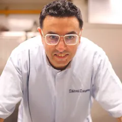Our Brand Chef, Dhiraj Dargan, whose culinary vision is the driving force behind Comorin's innovative menu. He masterfully blends regional Indian tastes with contemporary techniques.