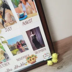 A close-up of the custom calendar frame, showing the detailed monthly photo layout and hand-drawn titles. I can customize the theme and style to fit any request.