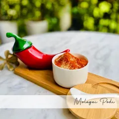 This is my Molagai Podi, famously known as 'gunpowder'. It gets its fiery kick from roasted red chillies and lentils. It is the perfect spicy accompaniment for a hot dosa or soft idli, especially when mixed with a little oil or ghee.