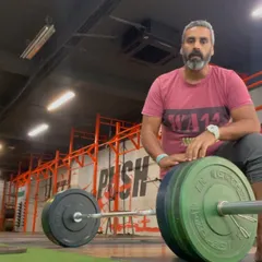 Taking a moment after a heavy deadlift set. This lift builds more than just muscle; it builds mental toughness and resilience. It's a fundamental exercise in all my strength programs.