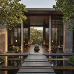 Luxury can be quiet and powerful. This minimalist entrance design uses clean lines, natural stone, and reflective water pools to create a serene and sophisticated transition from the outside world into a private sanctuary.