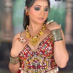 A close-up of my signature Navratri glam. The focus is on a dramatic smokey eye, sharp contouring, and a bold lip, ensuring the makeup is powerful enough to stand out during festive nights.