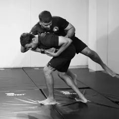 Securing a takedown from the back. Control is a critical component of grappling, and we drill these positions relentlessly.